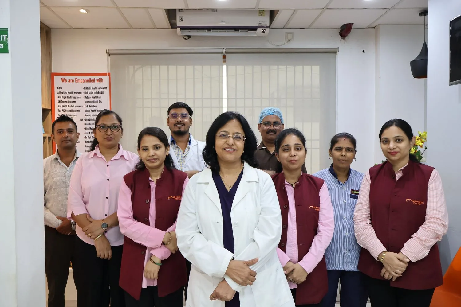 Dr. Poonam Jain with members of the centre's team in the waiting area